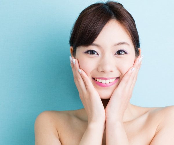attractive asian woman skin care image